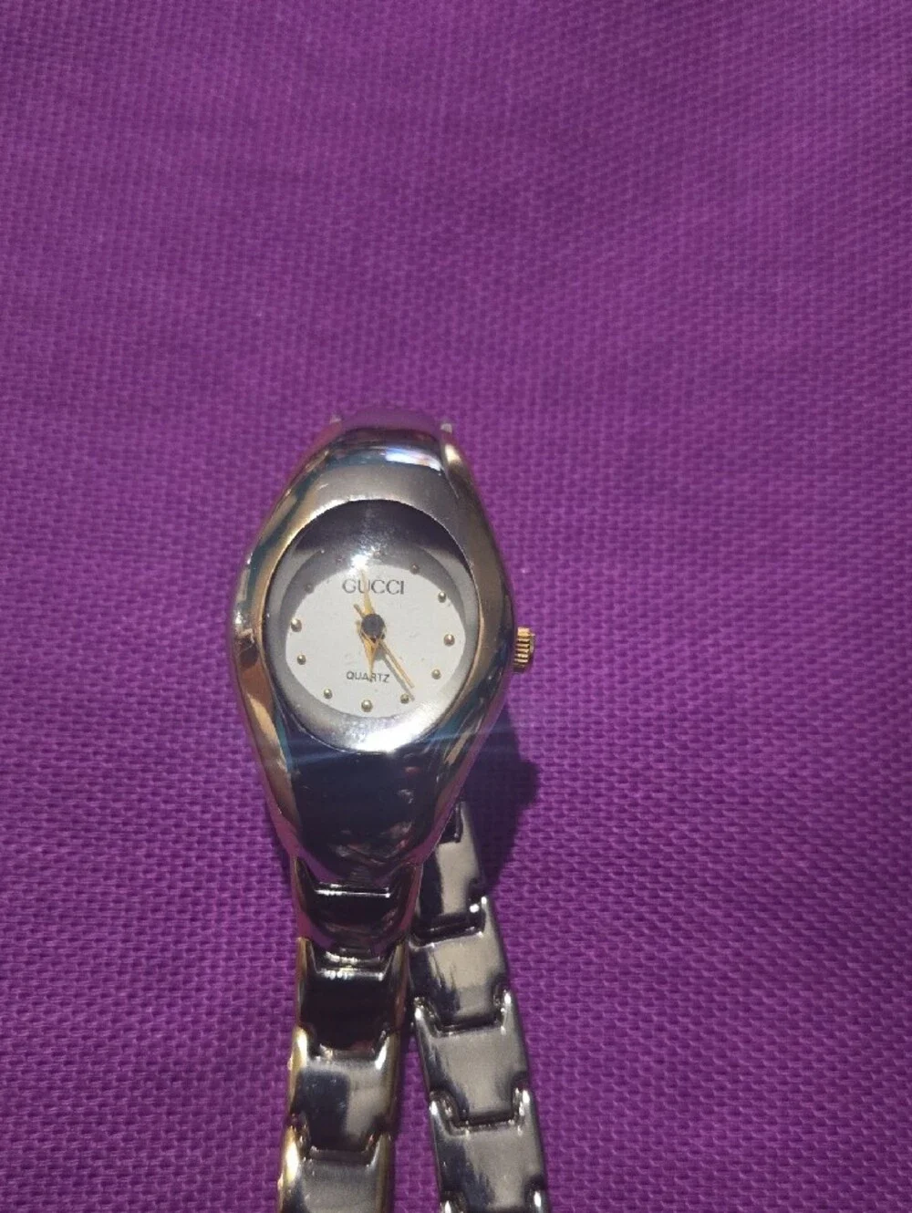 Gucci Silver-Tone Bracelet Watch with White Dial and Gold Accents